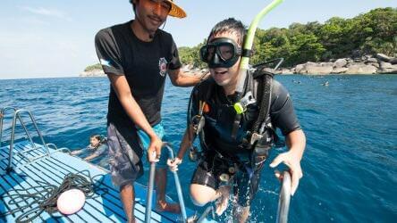 Happy customer returning after an amazing scuba dive with Local Dive Thailand